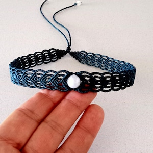 Green macrame choker. Strung with round moonstone beads.