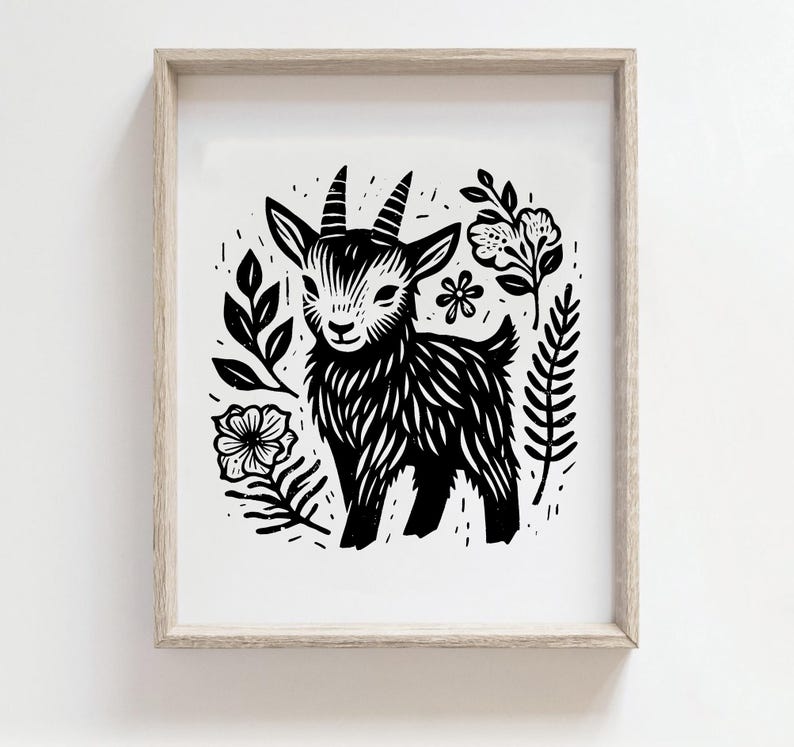 K&ouml;nnte beinhalten: Schwarz-wei&szlig;-Illustration einer Ziege mit einem floralen Design drumherum. Die Ziege steht auf allen vieren und hat einen freundlichen Ausdruck. Die Blumen sind stilisiert und haben ein einfaches Design.