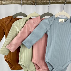 Baby bodysuit long sleeve made of organic cotton pink, blue, green, brown