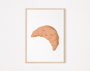 May include: A framed illustration of a cartoon croissant with a smiling face. The croissant is a light brown color and has a white background.