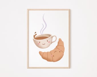 May include: A framed print featuring a whimsical illustration of a smiling coffee cup with steam and a smiling croissant. The coffee cup is light brown with a splash of coffee, and the croissant is golden brown.