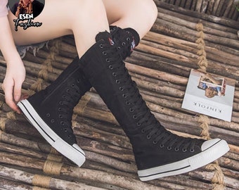 knee high converse boots with buckles and straps