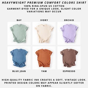 Six heavyweight premium comfort colors shirts in various hues. Colors include bay, ivory, orchid, blue jean, yam, and espresso. The shirts are 100% ring-spun US cotton and garment-dyed.
