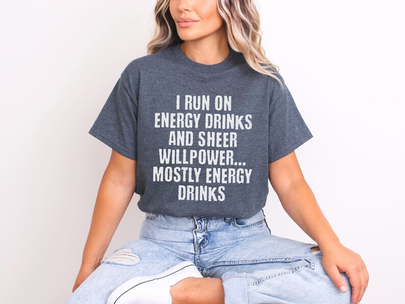 Grey t-shirt featuring text I run on energy drinks and sheer willpower... mostly energy drinks shirt