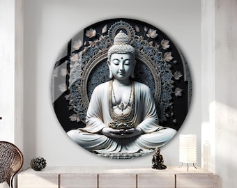 May include: A round wall art piece featuring a serene white Buddha statue in a meditative pose. The Buddha is set against a dark background with a decorative floral design. The artwork is displayed in a modern, well-lit room.