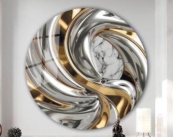 May include: A circular wall art piece with a dynamic, swirling design. It features polished silver and gold metallic elements that twist around a central marble pattern. The artwork is displayed on a white wall.