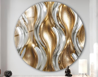 May include: A circular wall art piece with a metallic gold and silver abstract design. The artwork features flowing, wave-like patterns in shades of gold and silver, creating a textured, three-dimensional effect. The piece is mounted on a white wall.