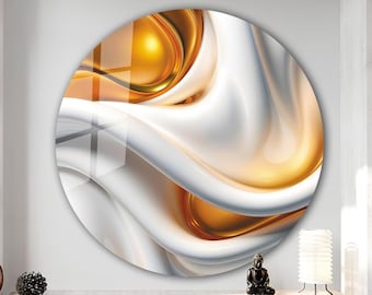 May include: A circular wall art piece with a glossy finish. The design features flowing, abstract shapes in white and gold, creating a sense of movement and depth. The artwork is mounted on a white wall.