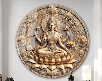 May include: A golden-colored, circular wall art piece featuring a detailed relief of a seated deity. The artwork includes lotus flowers, intricate floral patterns, and a halo effect, creating a spiritual and decorative element.