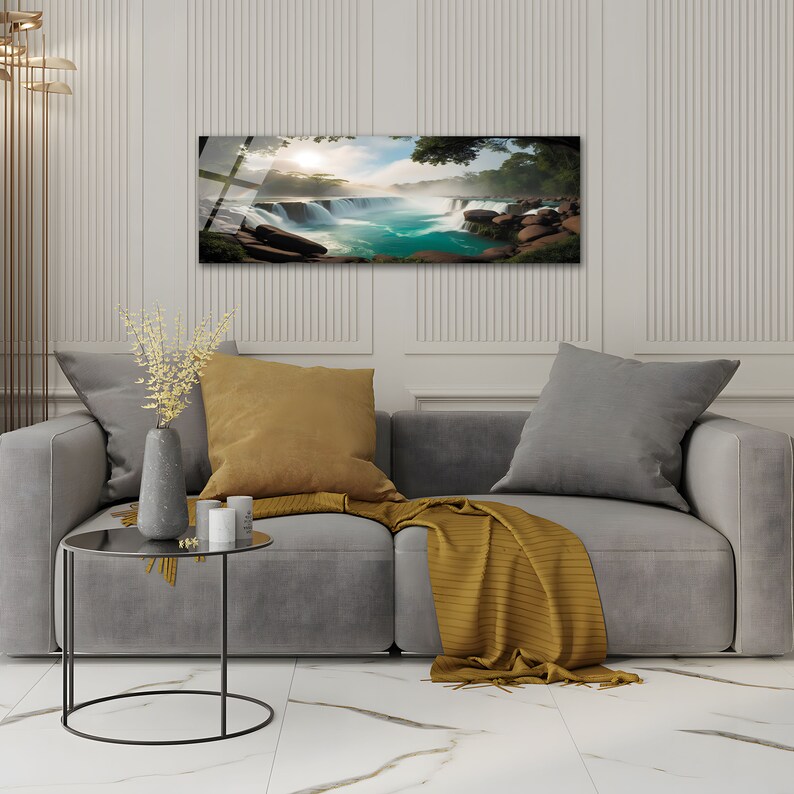 May include: A panoramic photograph of a waterfall cascading over rocks into a turquoise pool. The water is white and foamy, and the surrounding foliage is lush and green. The sun is shining brightly in the background, creating a warm and inviting atmosphere.