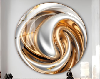 May include: A circular wall art piece featuring a swirling design in metallic gold and silver. The artwork has a glossy finish and is mounted on a white wall. The piece is a modern abstract design.