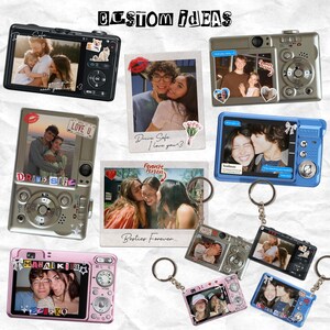 May include: Collection of digital cameras and keychains with custom photos. The cameras are in various colors, including black, silver, pink, and blue. Each camera displays a different photo, with text such as "Drive Safe" and "Love U". The phrase "Custom Ideas" is at the top.