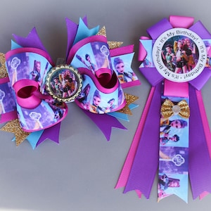 May include: A large, multi-layered hair bow and a matching rosette. The bow features purple, pink, and turquoise ribbons with a character print and gold glitter accents. The rosette has a "It's My Birthday!" message.