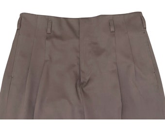 May include: A pair of brown pleated pants with a front zipper and button closure.
