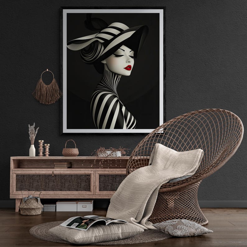 May include: A framed wall art print featuring a stylized illustration of a person wearing a wide-brimmed black and white striped hat and a matching striped high-neck garment, with bold red lips, set against a dark background.