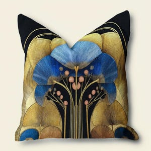 May include: A square throw pillow featuring a black background with a symmetrical, stylized floral pattern in shades of gold, blue, and soft peach. The design consists of fan-shaped petals, thin vertical lines, and small circular accents.
