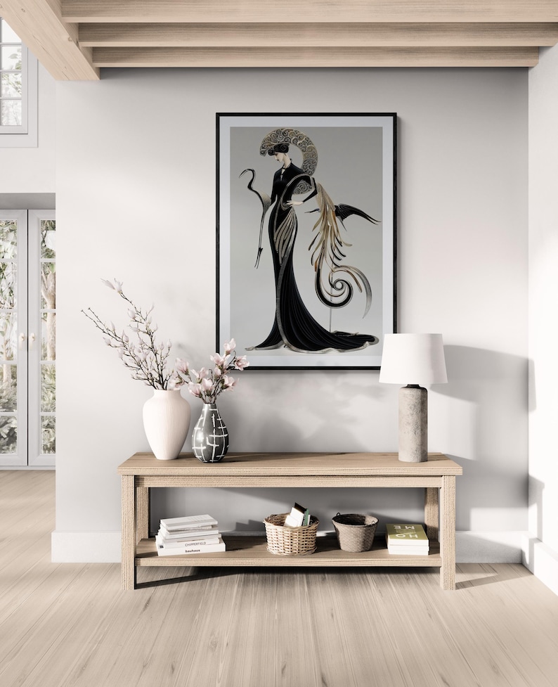 Art Nouveau inspired illustration of an elegant woman in a flowing black gown with silver and gold detailing, holding a graceful crane bird, framed by an ornate crescent halo and organic swirling motifs.