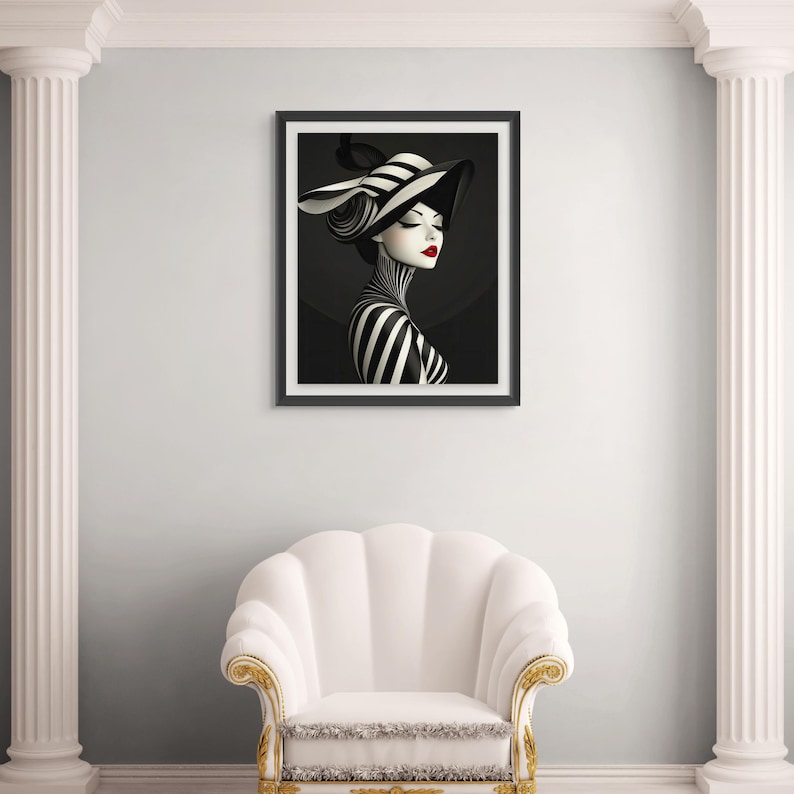 May include: A framed wall art print featuring a stylized portrait of a person wearing a wide-brimmed hat with black and white stripes. The subject has a high-collared striped garment, pale skin, dark eyeliner, and vibrant red lips against a dark background.