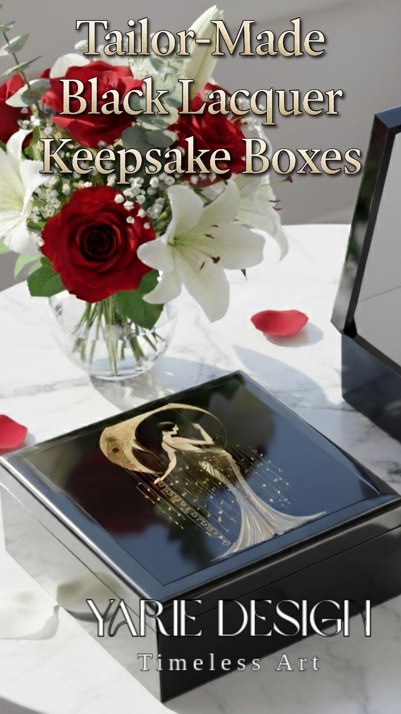 Black lacquer keepsake box with a gold art deco design on the lid. The box is rectangular and sits on a marble surface.