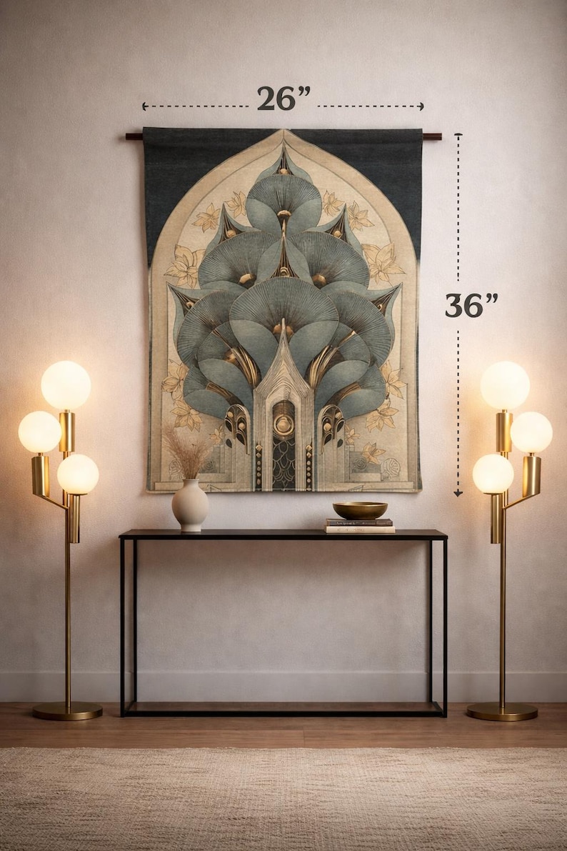 May include: A decorative wall tapestry, 26 inches wide and 36 inches tall, featuring a stylized floral design in shades of blue, gold, and beige. The tapestry hangs above a black console table, flanked by two gold floor lamps with globe lights.