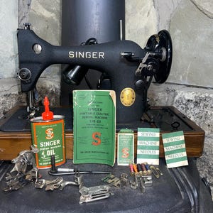 Vintage Singer Sewing Machine 128-23 with Original Accessories and Manuals