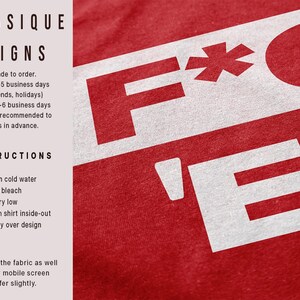 May include: Red t-shirt with a white graphic that reads "F*CK" in a bold, blocky font. The shirt also features the text "FANTASIQUE DESIGNS" and care instructions.