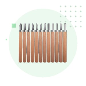 May include: A set of 15 wood carving tools with wooden handles and different shaped blades.