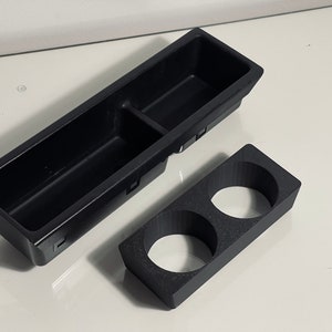 Standalone photo of the cupholder insert