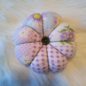 Purple flower pincushion