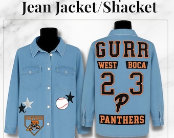 May include: Light blue denim jacket with custom team spirit design. Features a baseball, stars, and a team logo on the front. The back displays "GURR", "WEST BOCA", the number "23", and "PANTHERS".
