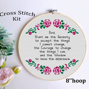 May include: Cross stitch kit featuring a quote about serenity, courage, and wisdom. The quote is surrounded by pink roses and green leaves. The kit includes an 8-inch hoop.