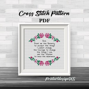 May include: Cross stitch pattern PDF featuring a quote about serenity, courage, and wisdom. The quote is surrounded by a border of pink roses and green leaves.