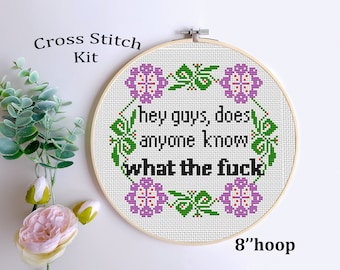 May include: Cross stitch kit with a white background and a floral design around the text "Hey guys, does anyone know what the fuck". The kit is in an 8 inch hoop.