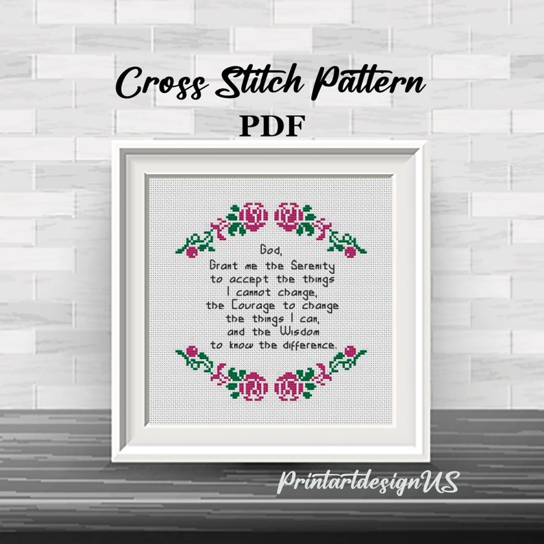 May include: Cross stitch pattern PDF featuring a framed design with a quote about serenity, courage, and wisdom. The quote is surrounded by a border of pink roses and green leaves.