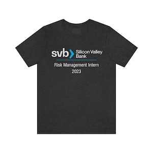 May include: A dark heather grey t-shirt with the Silicon Valley Bank logo and the text "Risk Management Intern 2023".