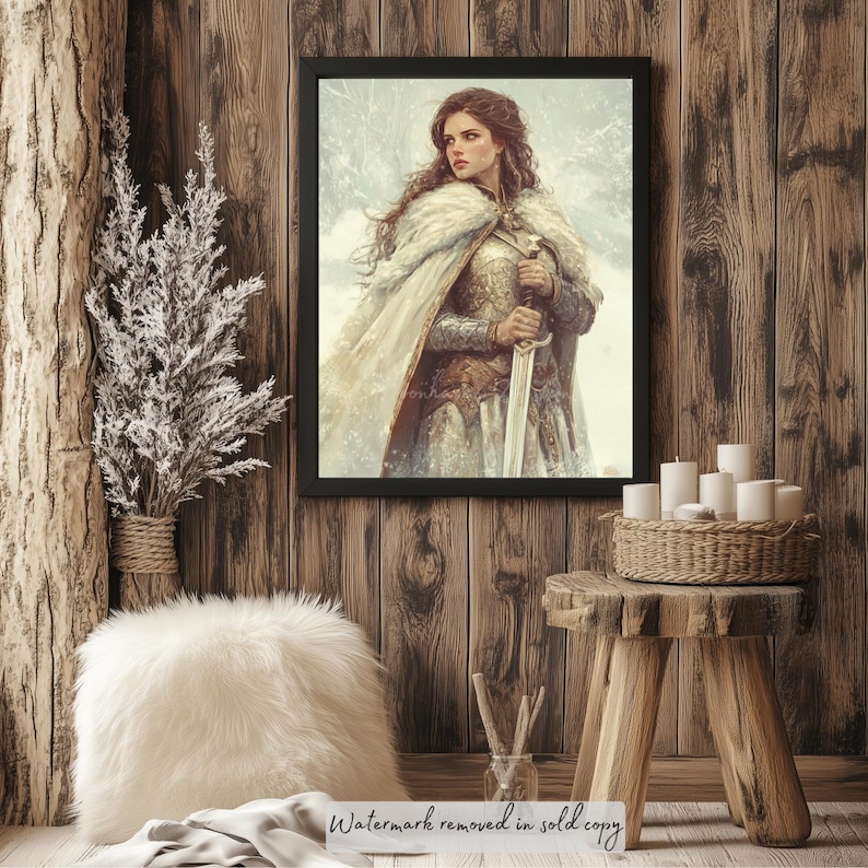 May include: A framed painting of a woman in a white cloak and armor holding a sword. She is standing in a snowy landscape. The painting is framed in black and is hanging on a wooden wall.