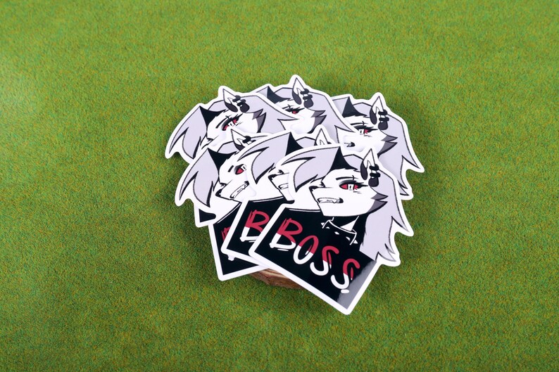 May include: A set of five stickers featuring a cartoon character with white hair, red eyes, and a black and white outfit. The stickers have the word "BOSS" printed on them in white and red letters.