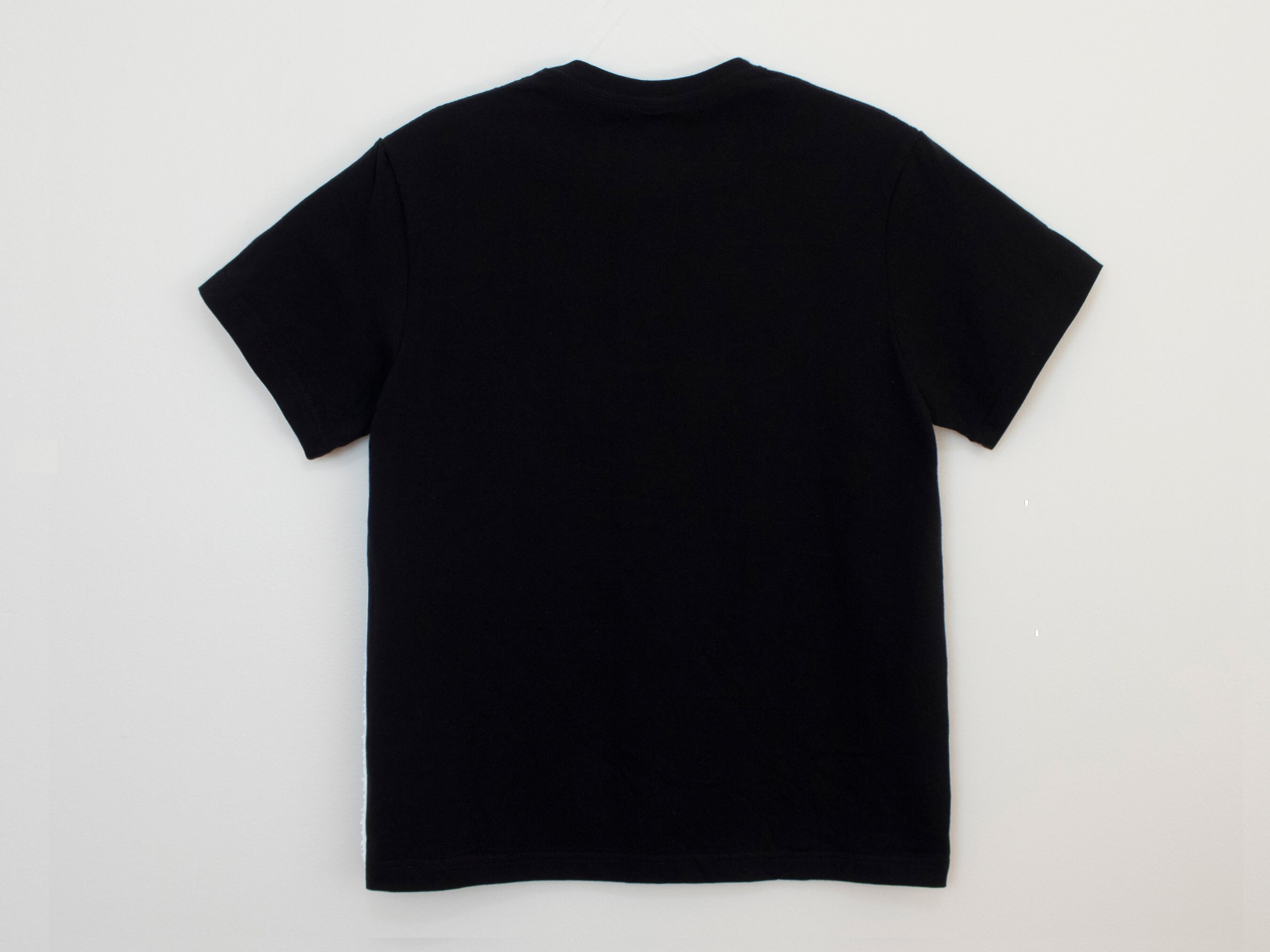 Black T-shirt With Jean Pocket. Destroyed Ripped Denim