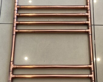 Heated copper towel rail