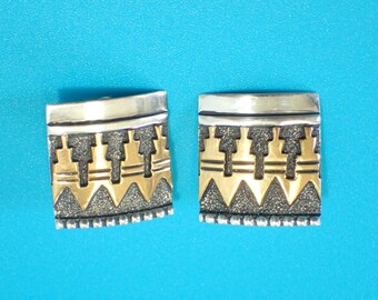 Vintage Sterling Silver Clip On Earrings by Tommy Singer. Signed.