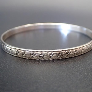 Vintage Sterling Silver Bangle Bracelet with Flower and Leaf Design.