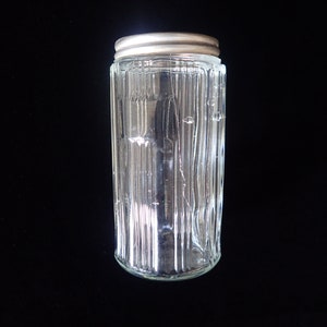 Vintage Hoosier spice jar. Old bubble glass.