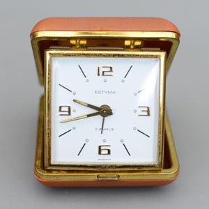Reloj despertador mecánico vintage Estyma de 2 joyas, de Alemania, que funciona.