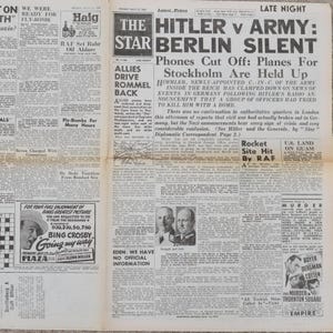 May include: A vintage newspaper page with headlines about World War II. Headlines include "HITLER v ARMY: BERLIN SILENT" and "ALLIES DRIVE ROMMEL BACK." The page also features a Bing Crosby movie advertisement and other news articles.