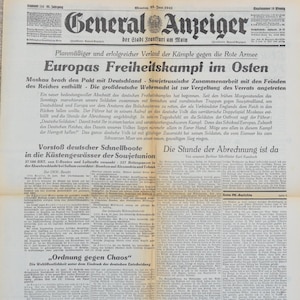 May include: A historical German newspaper, "General Anzeiger", dated 1941. The headline proclaims "Europa's Freiheitskampf im Osten." The paper is aged, with black text on yellowed paper. Articles cover military actions and political developments of the time.