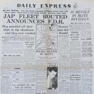 Könnte beinhalten: Eine historische Titelseite der Daily Express vom 28. Oktober 1941 mit Schlagzeilen über den Krieg im Pazifik. Die Schlagzeile lautet "Jap Fleet Routed Announces F.D.R.". Enthält Artikel und eine Karte der Philippinen.