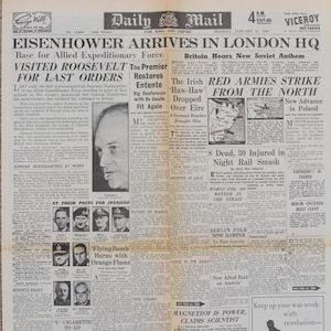 May include: A Daily Mail newspaper from January 17, 1944, reporting on Eisenhower's arrival in London and the Red Armies' advance. The front page includes articles and images related to the war, with a focus on the Allied forces.