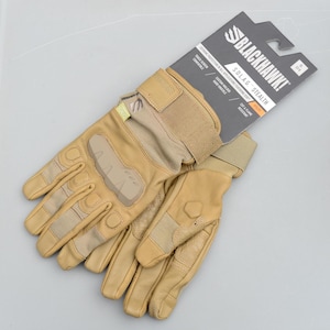 May include: Tan tactical gloves with reinforced knuckles and palm padding. The gloves are labeled "BLACKHAWK! S.O.L.A.G. STEALTH" and feature a touch screen compatible design. The gloves are cut and flame resistant.