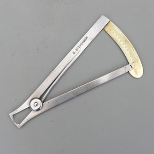 May include: A rustic wooden sign with the text "Welcome to our home" in white lettering. The sign features a distressed finish and a simple, inviting design, perfect for front door decor.