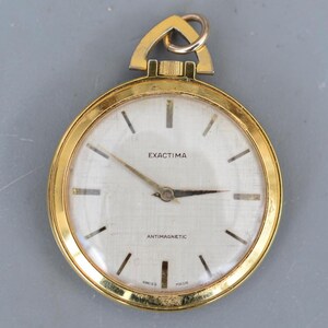 Reloj de bolsillo suizo antimagnético vintage Exactima en funcionamiento